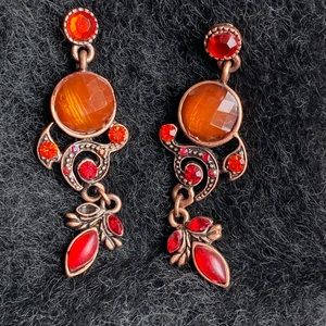Red and orange brass earrings